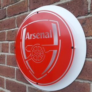 Handmade red and white circular sign with the Arsenal Football Club badge.